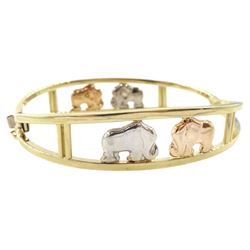 9ct gold elephant design hinged bangle, stamped 375