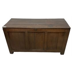 Large 18th century oak coffer or blanket box, hinged lid over triple panelled front, panelled back and sides, on stile supports 