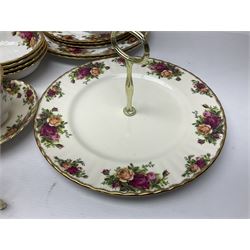 Royal Albert Old Country Roses pattern coffee set for four, comprising coffee pot, milk jug, cups and saucers, cake plate, together with six dinner plates, side plates etc (34) 