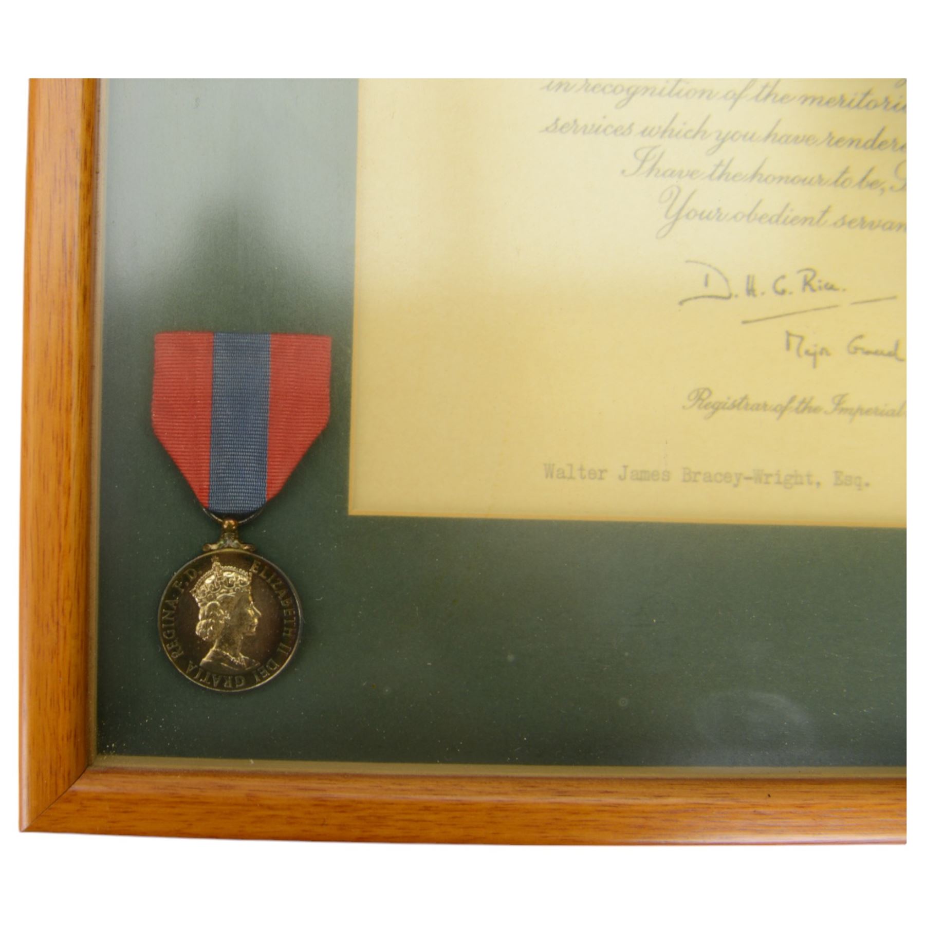 Queen Elizabeth II Imperial Service medal awarded to Waler James Bracey Esq, together with his dog tags, photographs and related ephemera 