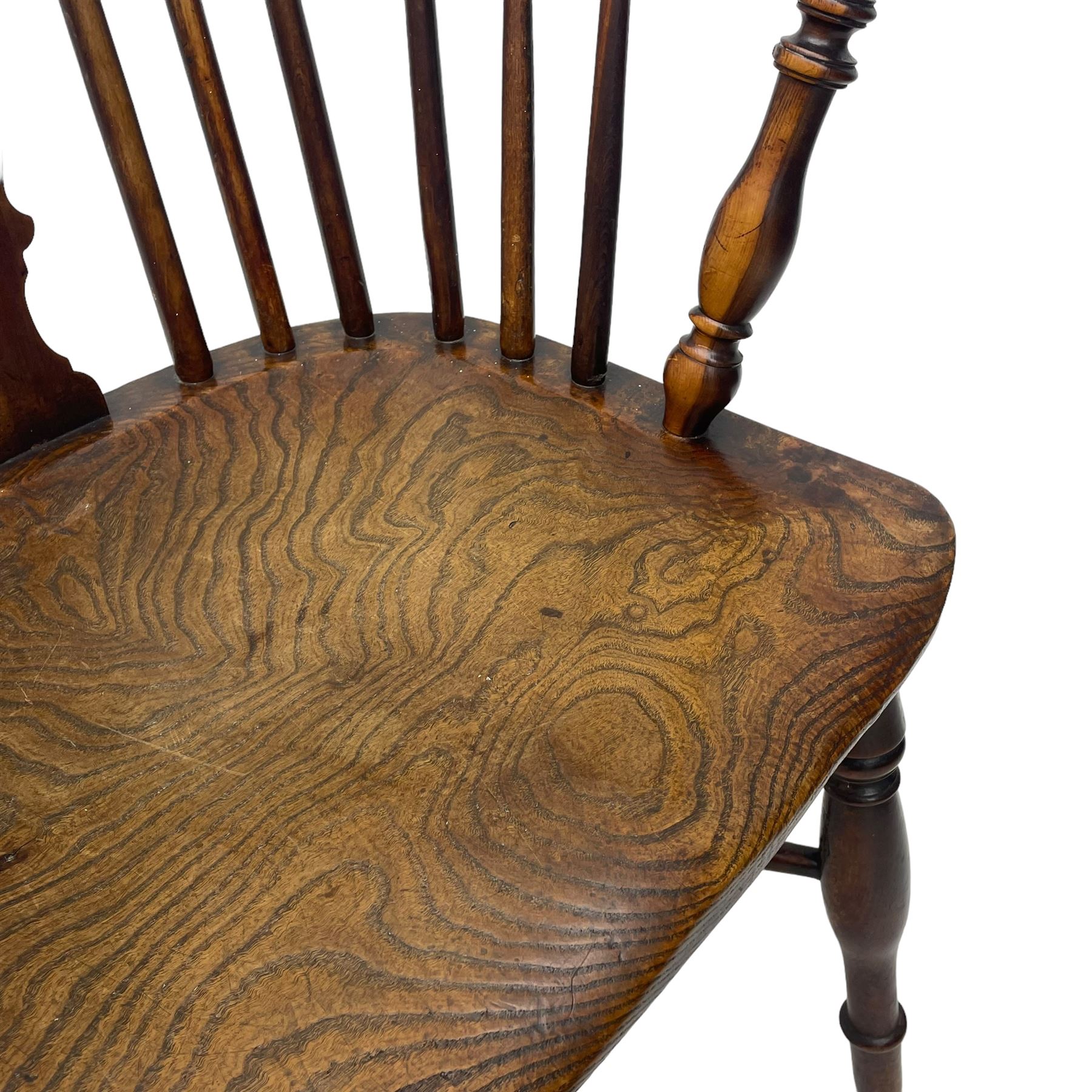 19th century yew wood and elm Windsor armchair, low double hoop stick and pierced splat back, dished seat on turned supports united by crinoline stretchers