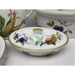 Royal Worcester Evesham pattern, including covered pot de cremes, twin handle tureen, serving dishes, flan dishes, side plates etc  