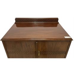 Early 20th century mahogany tallboy, double cupboard over three drawers, on ball and claw carved cabriole feet