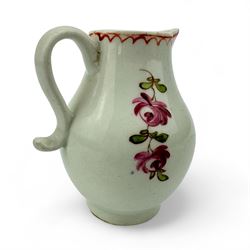 18th century Lowestoft porcelain sparrow beak jug, hand painted in polychrome enamels with a starflower and floral sprays, within line and loop brick-red border, H8cm