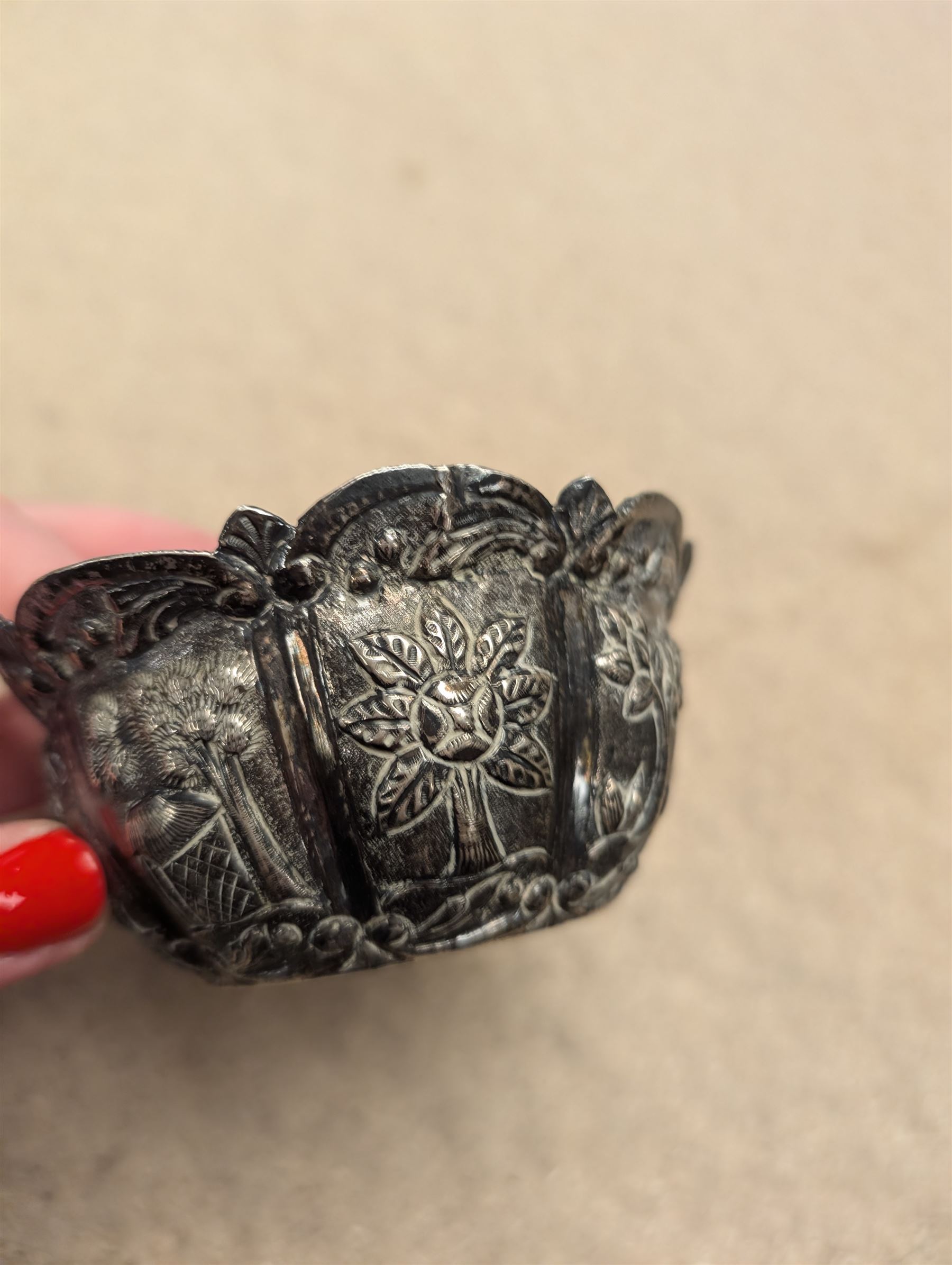 Indian silver dish, of circular form chased and repousse decorated with figural scenes