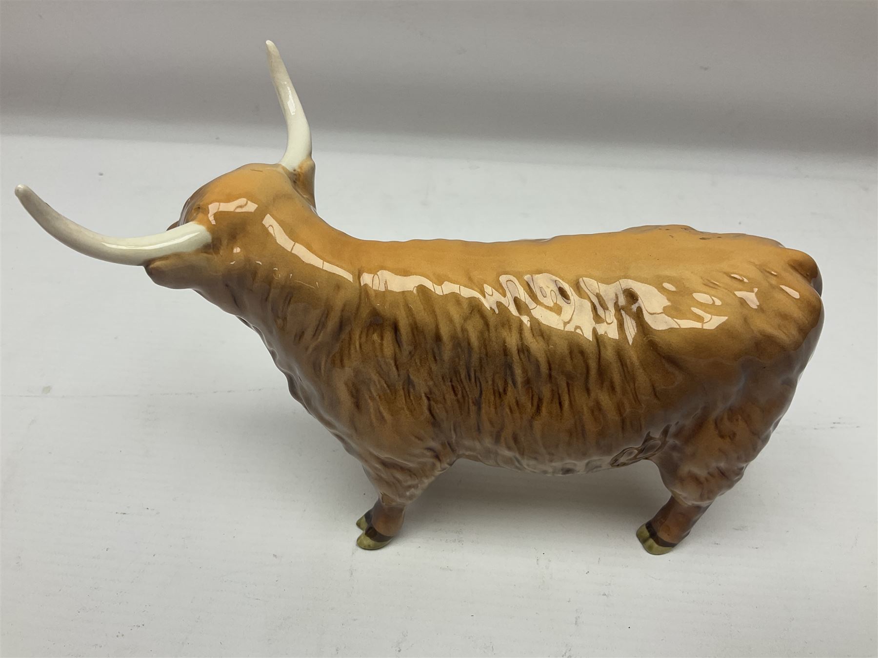 Beswick Highland family group, comprising bull 2008, cow 1740, and calf 1727D