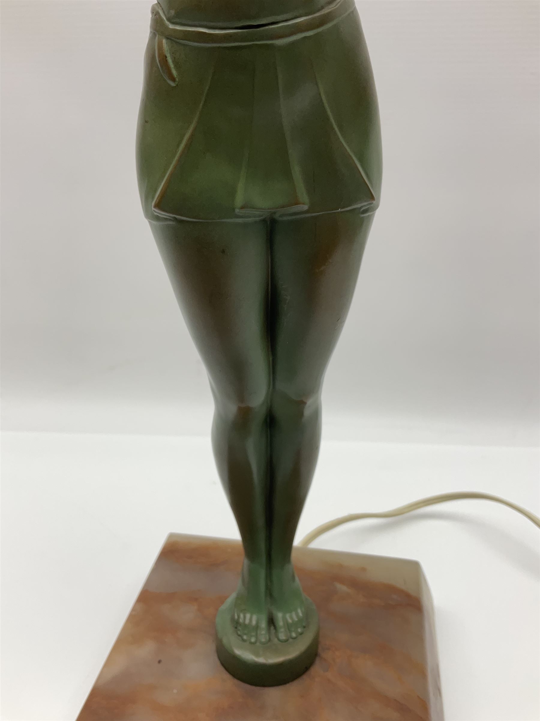 Art Deco patinated spelter table lamp, modelled as a young woman, upon a canted square alabaster plinth, H49.5cm