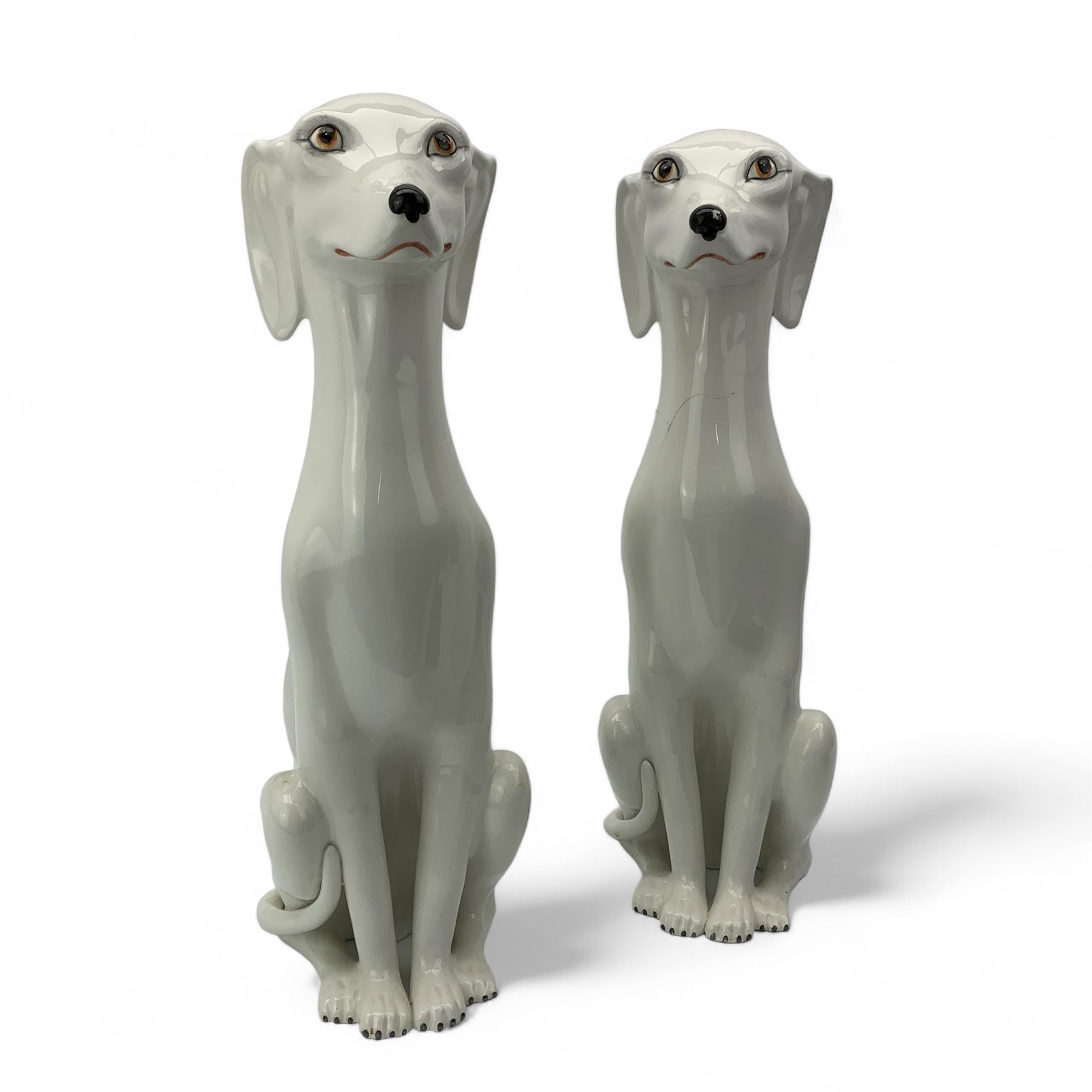 Two mid century Italian white glazed Greyhound models, both seated, H52cm 