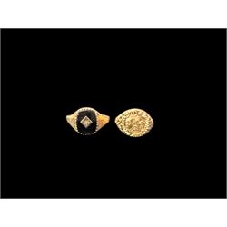 Two 9ct gold rings, to include onyx and diamond signet ring and a coin set signet ring, bo...