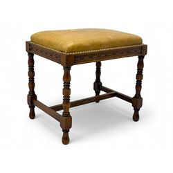 Late Victorian oak stool with a mustard leather upholstered seat, decorative brass nailhea...