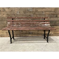 Wrought metal and wood slatted garden bench