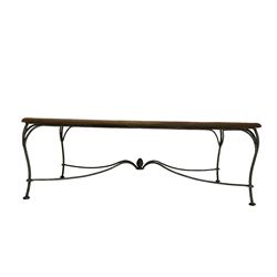 Mid-20th century coffee table, rectangular tiled wooden top framed by bamboo detailing, supported by wrought iron base with scrolled legs and central mosaic accent