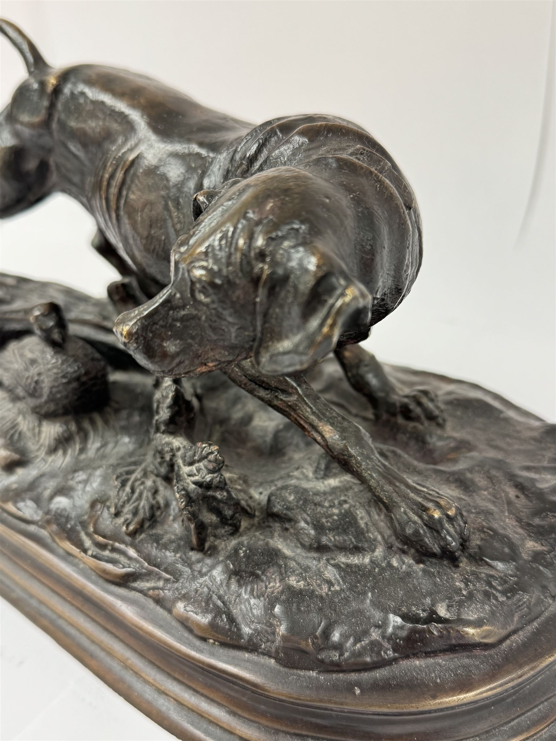 Bronzed figure after Paul-Edouard Delabrierre, modelled as a crouching Pointer with pheasant, inscribed E. Delabrierre to base, H16.5m