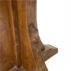 Mouseman - oak occasional table, octagonal adzed top, cruciform pedestal on sledge feet, carved with mouse signature, by the workshop of Robert Thompson, Kilburn 