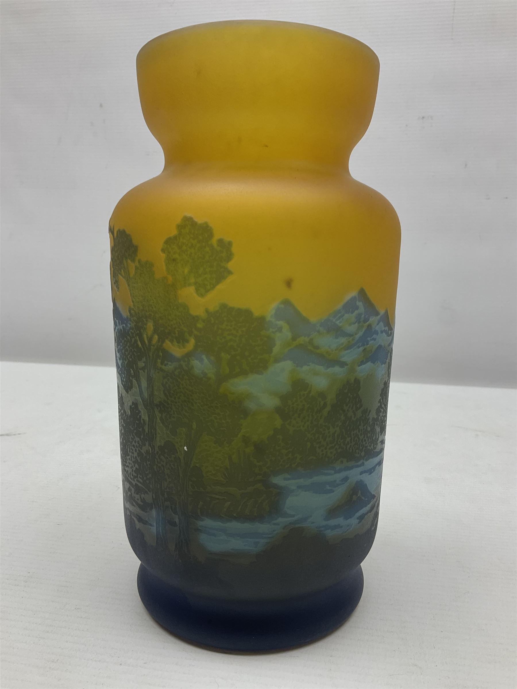 Art Nouveau style glass vase, in the style of Galle,the body decorated with woodland and mountain scene, upon a yellow ground, H20cm 