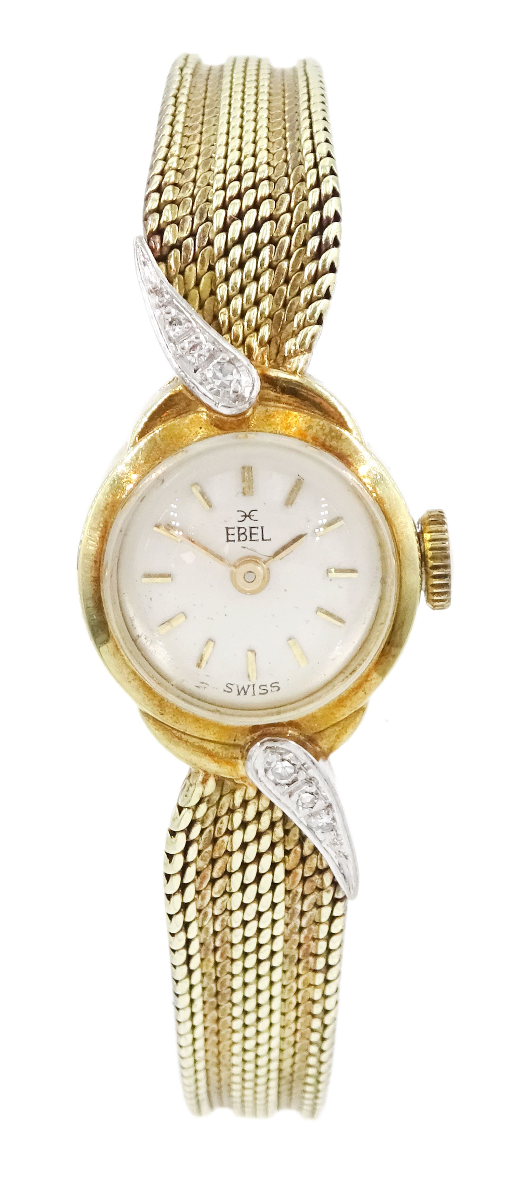 Ebel ladies 14ct gold manual wind diamond wristwatch, silvered dial with baton hour markers, a row of diamonds set each side of the case, on integrated 14ct gold bracelet, stamped 585