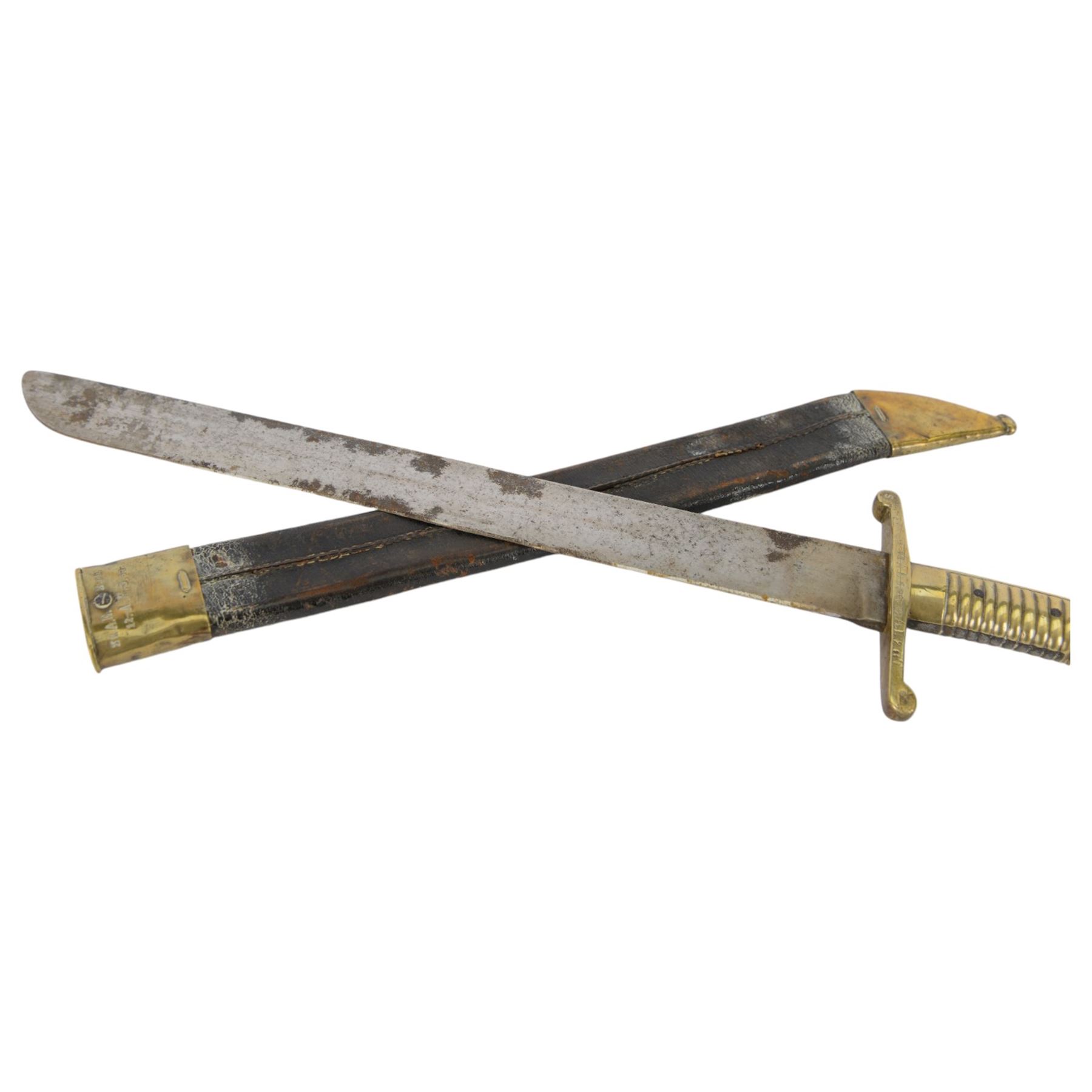 Prussian model 1855 Infantry Pioneers short sword, single edge blade stamped with a crown, quillon marked 28 AE.3.99. 32.A.E.2.99.1, with ribbed grip, in brass mounted leather scabbard, L65cm