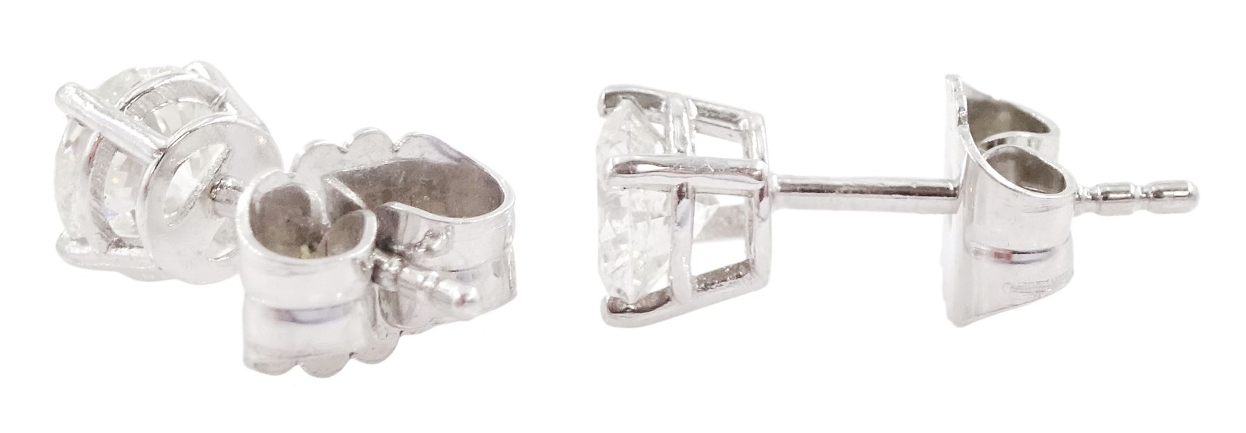 Pair of platinum round brilliant cut diamond stud earrings, hallmarked, total diamond weight approx 1.40 carat