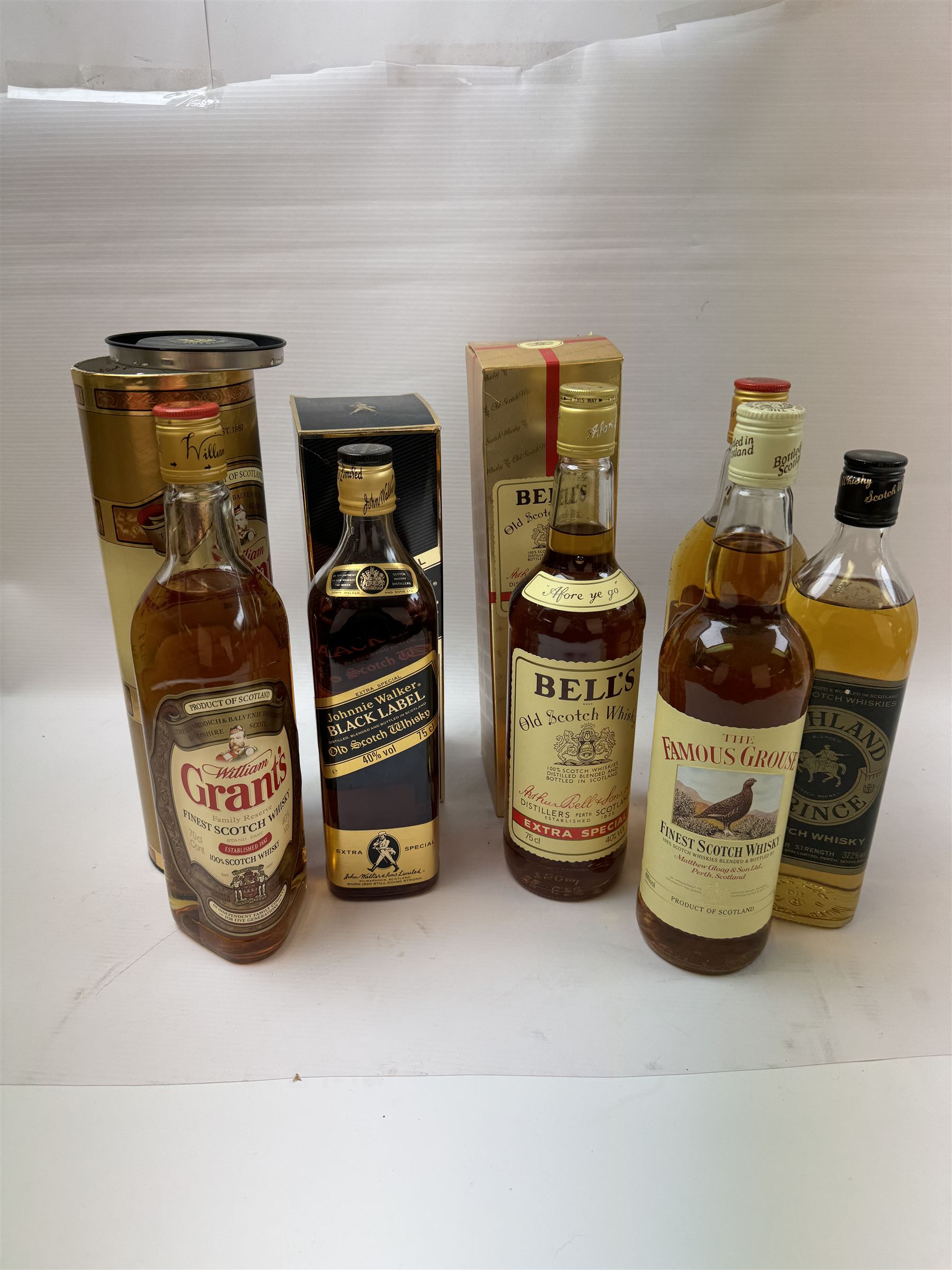 Six bottles of blended Scotch whisky, including Grants, Johnnie Walker Black Label, Highland Whisky etc, various contents and proof  