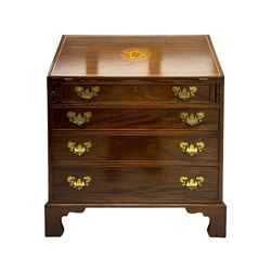 Mid-to-late 20th century inlaid mahogany bureau, inlaid floral medallion to the top, the fall front opening to reveal fitted interior with pigeonholes, small drawers and central cupboard, green inset writing surface with gilt tooling, four drawers below with brass handles, raised on shaped bracket feet