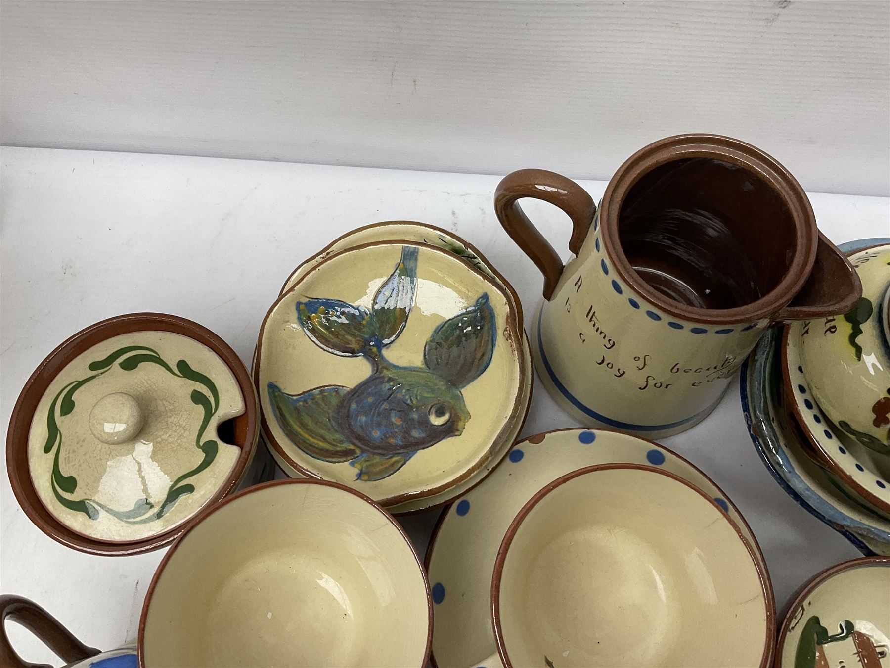 Collection of Motto ware, including cups and saucers, coffee pot, milk jug etc together with studio pottery dishes 