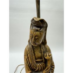 Carved soapstone lamp modelled as Guan Yin, upon hardwood base, with pink fabric shade, including shade H77.5cm