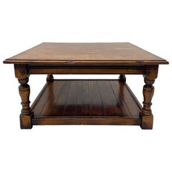 Square elm coffee table, square ovolo-moulded top with fruitwood band, turned supports united by undertier 