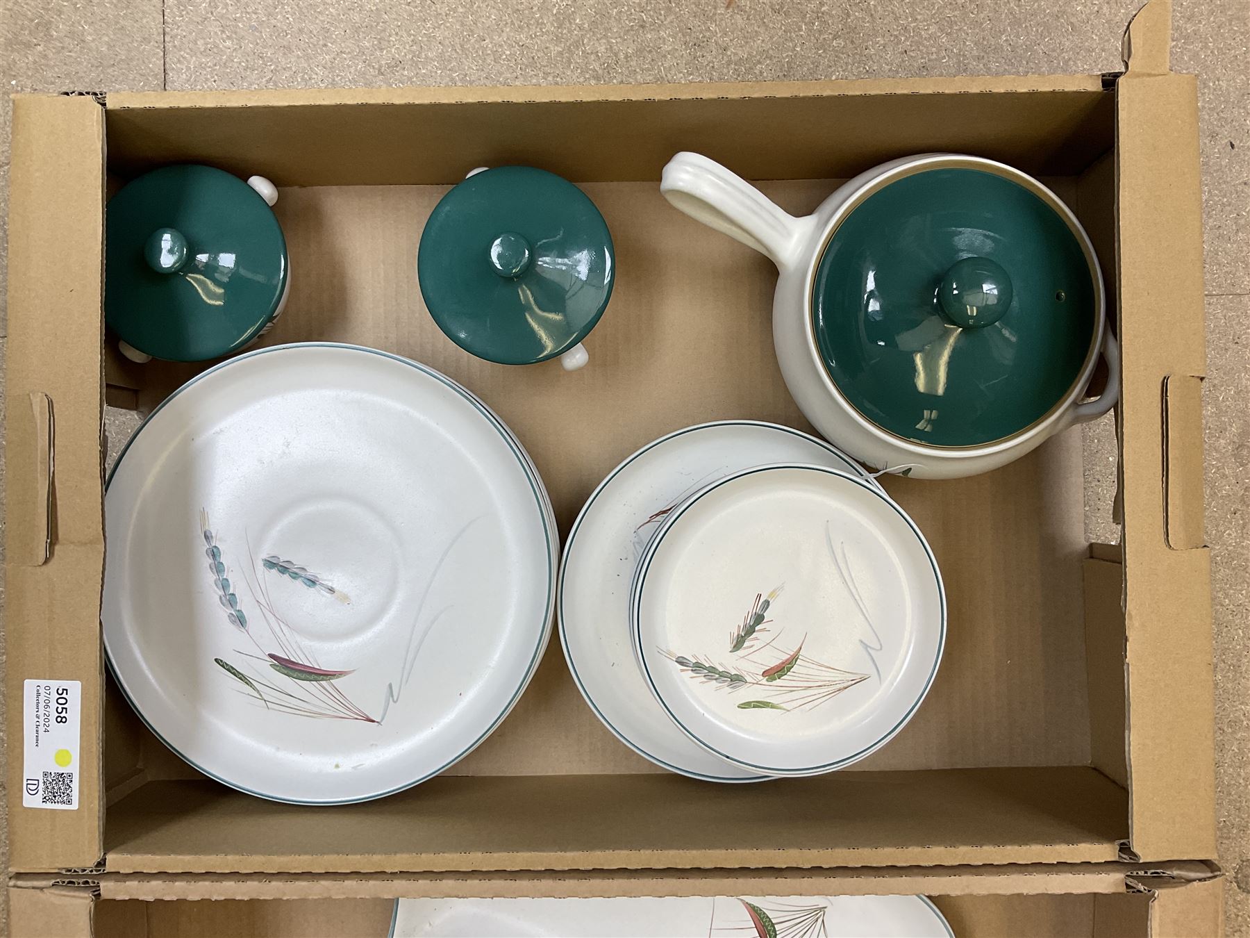 Denby part dinner service, decorated in the Greenwheat pattern, comprising dinner plates, dessert plates, side plates, lidded tureen, pair of smaller lidded dishes, sauce boat, and various serving dishes, in two boxes