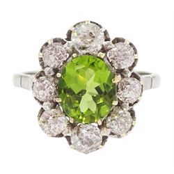 18ct white gold oval cut peridot and old cut diamond cluster ring, stamped 18ct, total diamond weight approx 1.20 carat