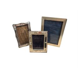 Two silver photograph frames, hallmarked and a plated frame, largest H17.5cm