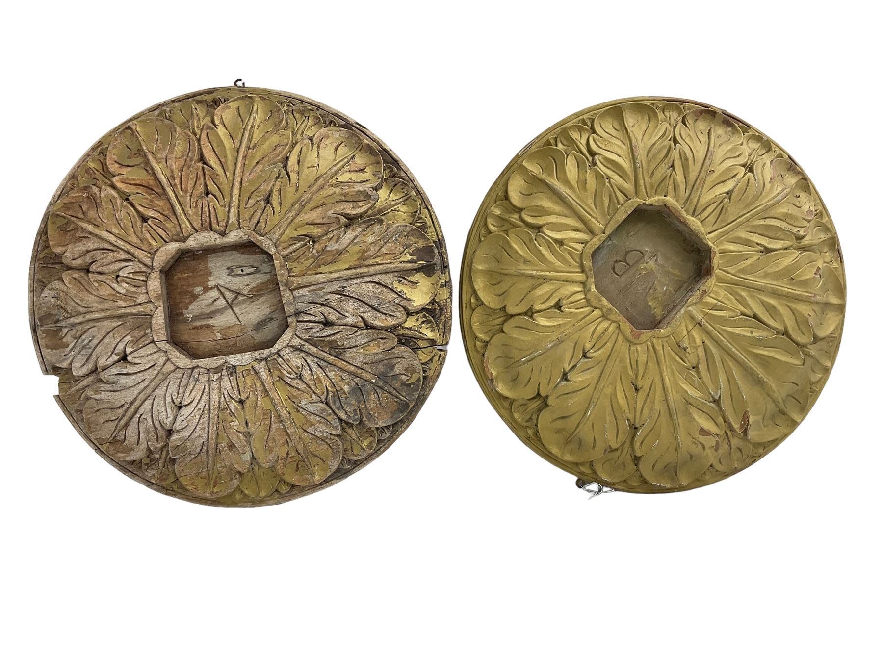 Two 20th century hardwood mounts, circular form carved with extending acanthus leaves