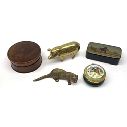 A group of collectables, comprising a novelty brass vesta, modelled in the form of a pig, L8.5cm, a small brass model of an otter, indistinctly stamped beneath, L9cm, a treen box of circular form, D7cm, a papier mache snuff box, detailed with Scottish Highland Terrier with rabbit in mouth and further marked 'To be delivered immediately', and a Halcyondays enamel box detailed with gun dogs. 