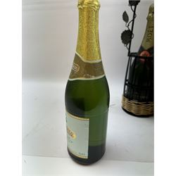 Moet & Chandon 1996 champagne, together with Babycham sparkling perry, in a wine holder, various contents and proof 