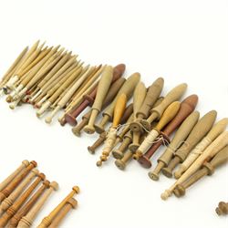 Collection of lace maker's bobbins to include ornate coloured glass examples, eight Maltese wooden bobbins, twenty brass bobbins with turned and textured shafts, together with various wooden examples, some with ornate glass beaded weights/ spangles 