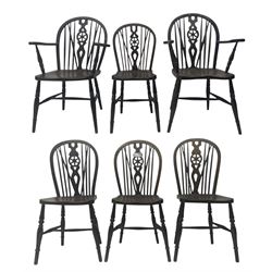 Set of six 19th century elm and ash dining chairs, hoop back with pierced wheel-shaped central splat, shaped saddle seat, raised on turned supports united by H-stretchers