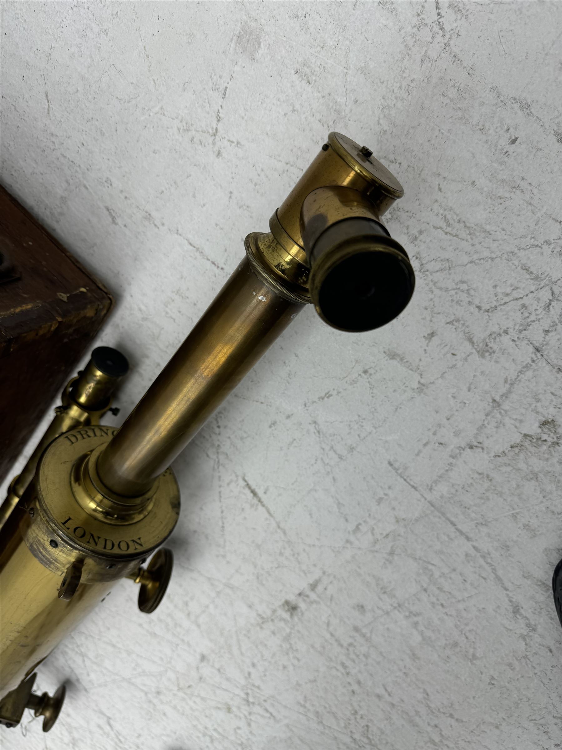 19th century brass reflecting telescope by Dring & Fage, London, the cylinder with inter-changable eyepieces and mounted with sighting scope, contained within wooden box, cylinder diameter 4.5in, length (without lens) 52in 