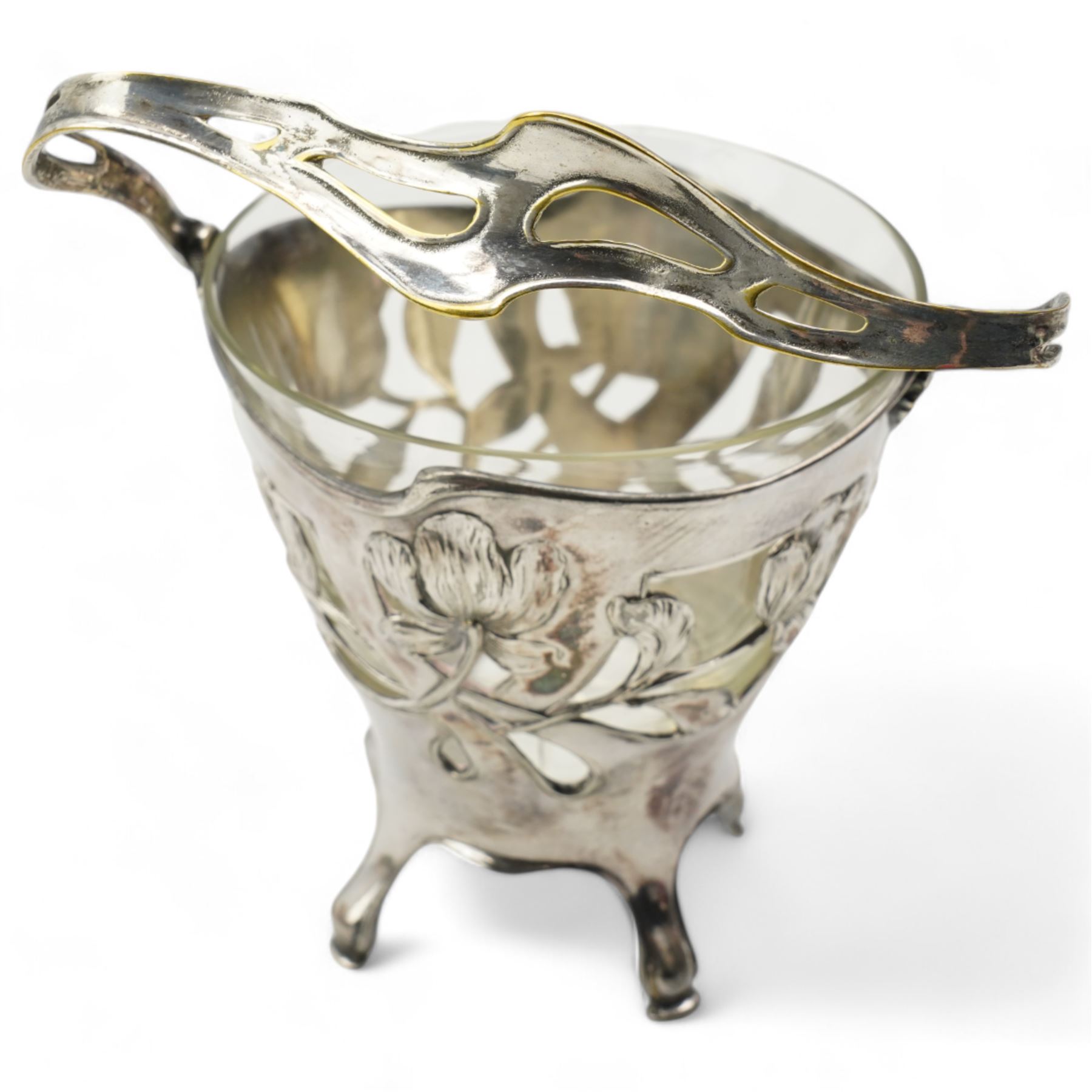 Early 20th century German Art Nouveau silver-plated bonbon basket by Dupper & Bernhold - Esslingen, with pierced and moulded floral body, stylised swing handle and glass liner, stamped DBE, H18cm 