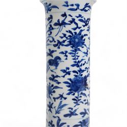 Pair of 19th century Chinese blue and white sleeve vases, each of cylindrical form with flared rim, painted with exotic birds amongst foliate sprays, four character Kangxi mark beneath, H21cm