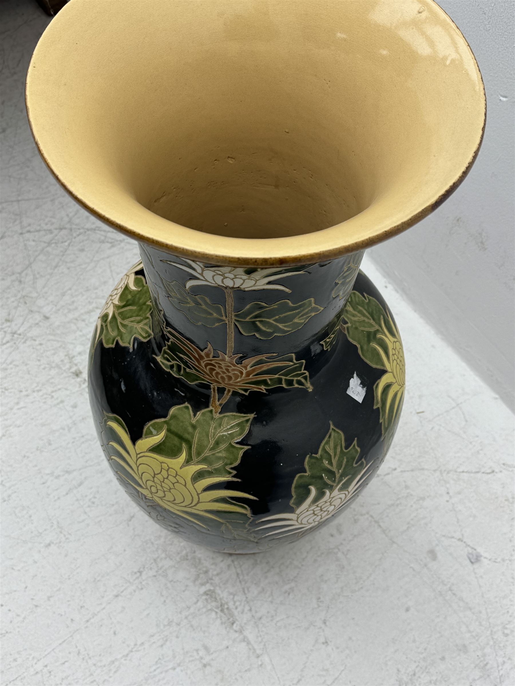 Floor vase with stylised flowers on a black ground, H84cm