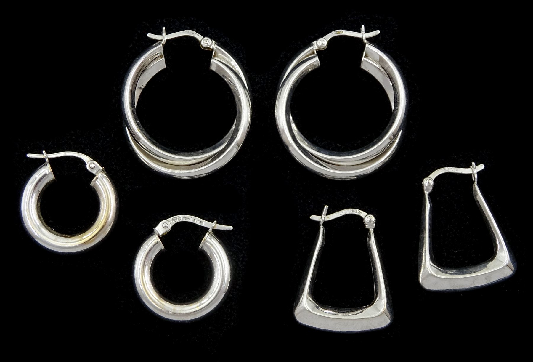 Three pairs of 9ct white gold hoop earrings, stamped or hallmarked