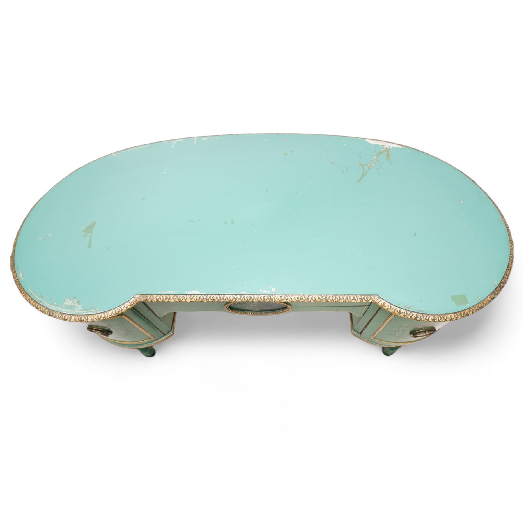 Edwardian Adam Revival green-painted and parcel gilt kneehole desk or dressing table, kidney shaped form with foliate carved edge, fitted with three drawers painted with urn and fruiting laurel wreaths with ribbon ties, on acanthus leaf and draped festoon decorated turned supports 