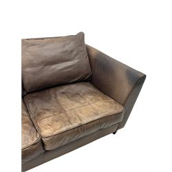 Collins & Hayes - contemporary grande three-seater sofa upholstered in brown leather, with curved arms and standing on tapering feet