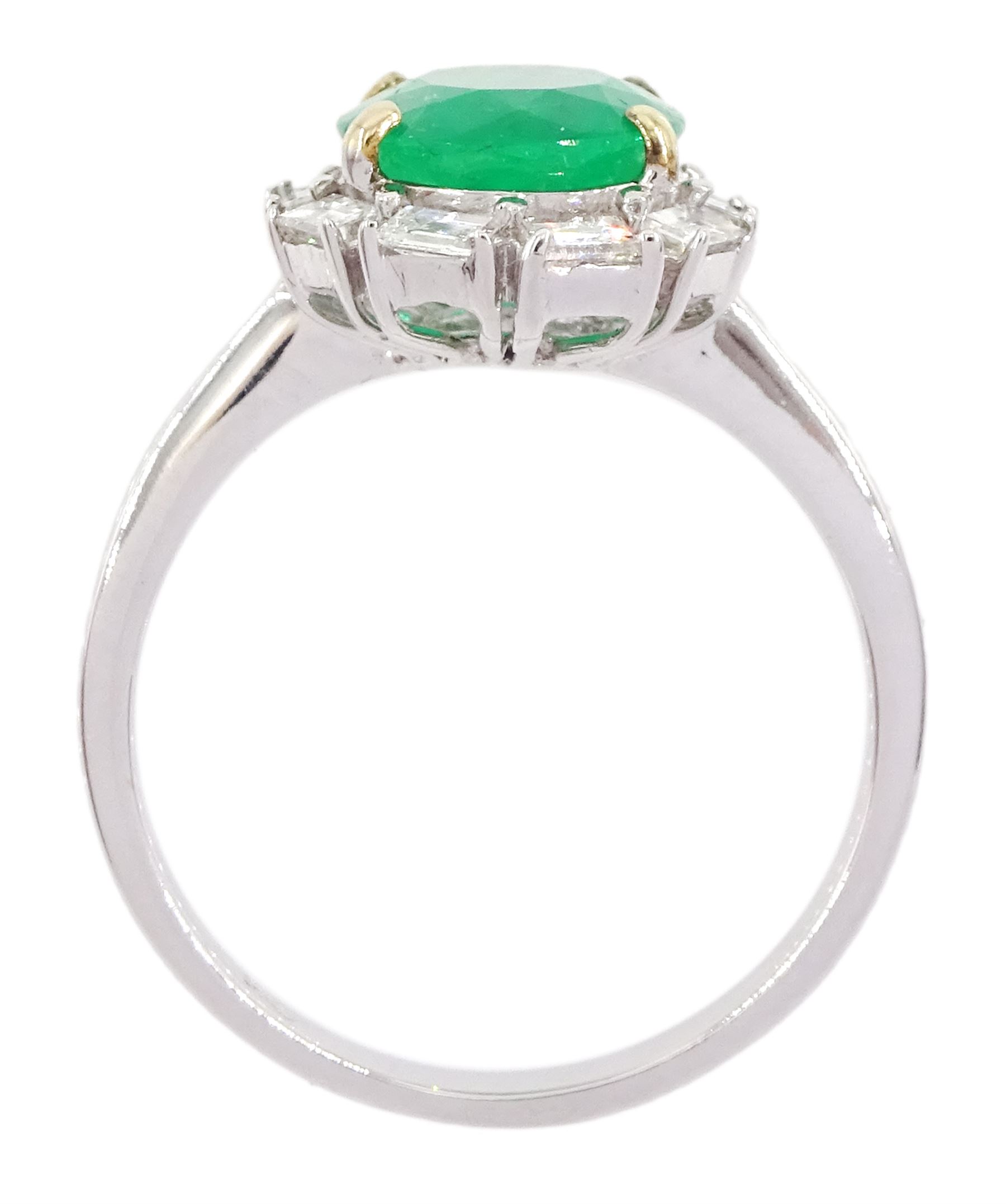 18ct white gold oval cut emerald and baguette cut diamond cluster ring, stamped 750, emerald approx 2.05 carat, total diamond weight approx 0.40 carat