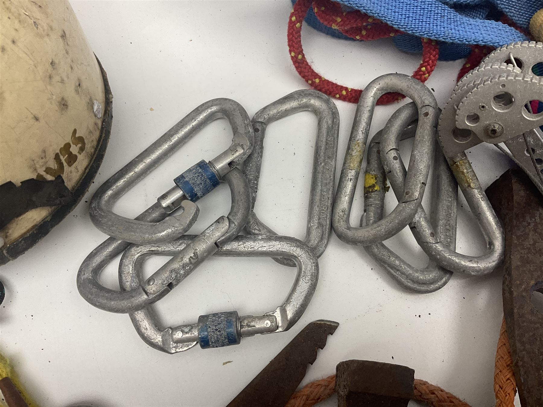 Collection of 1960s/70s climbing equipment including two original Hamish McInnes Pterodactyl ice axes, Joe Brown helmet, carabiners, ropes and wires etc