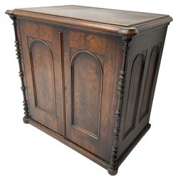 Victorian lacquered mahogany cupboard, fitted with two arch panelled doors enclosing two shelves, flanked by split turned uprights