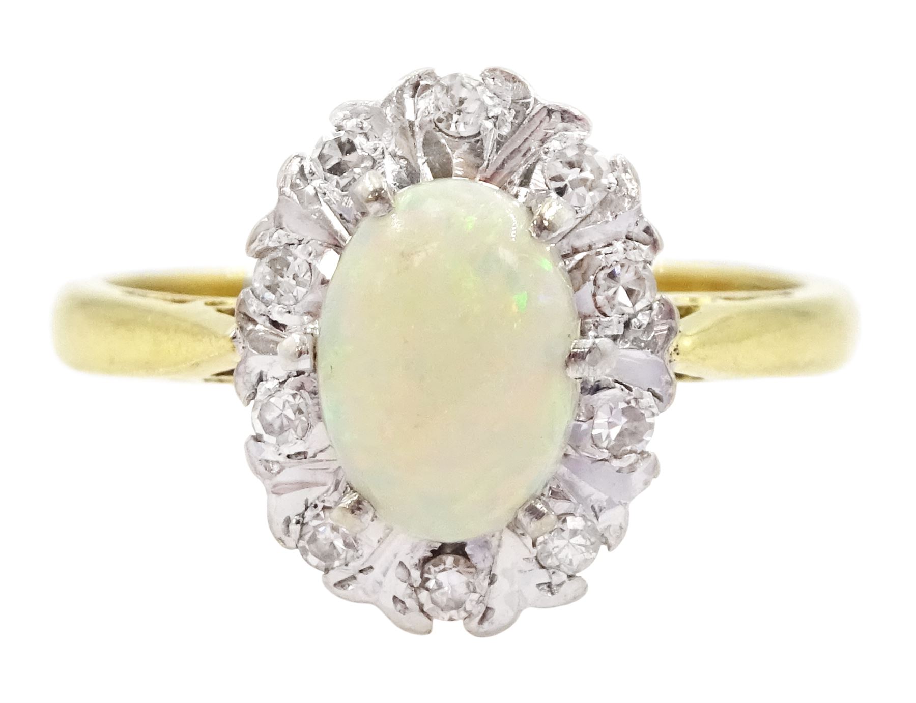 18ct gold opal and round brilliant cut diamond cluster ring, London 1975