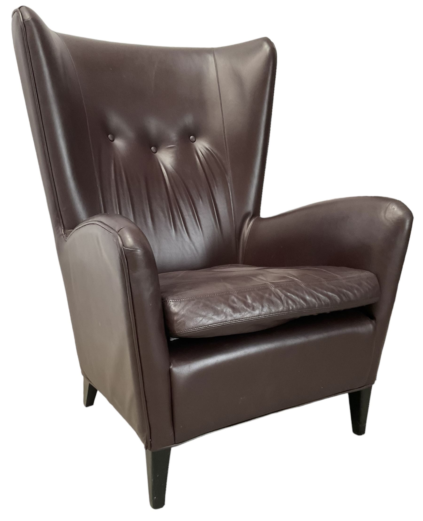 Wing back armchair upholstered in cocoa brown leather