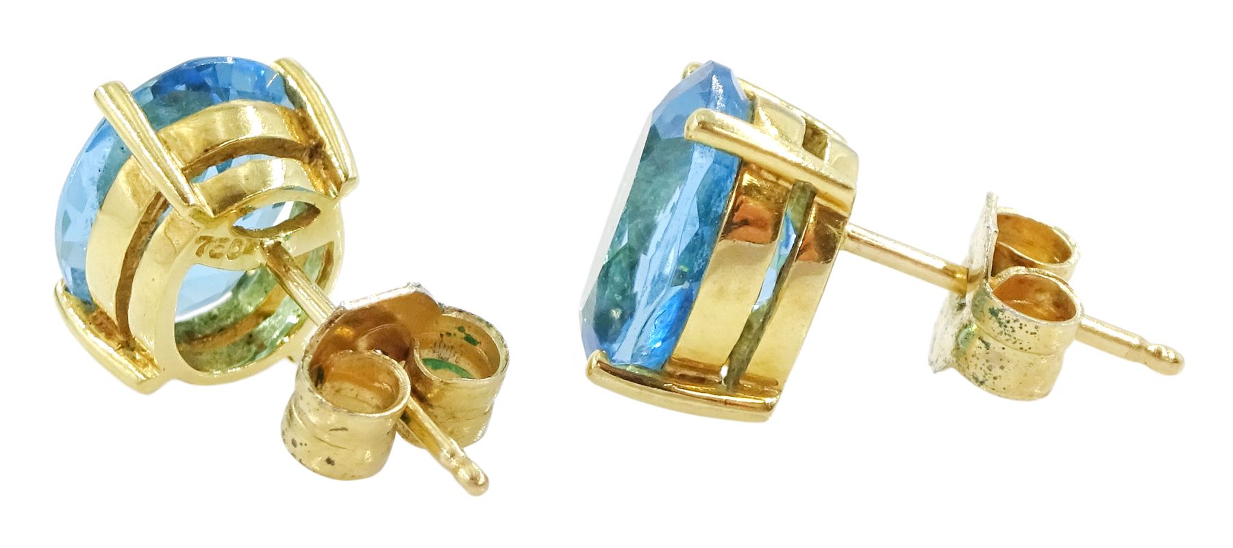 Pair of 18ct gold oval cut Swiss blue topaz stud earrings, stamped 750, total topaz weight approx 5.85 carat