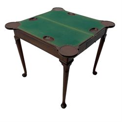 George III mahogany games table, the rectangular fold-over top with extending stepped rounded corners, opening to reveal baize lined interior with sunken counter wells, concertina action base, on lappet cabriole supports