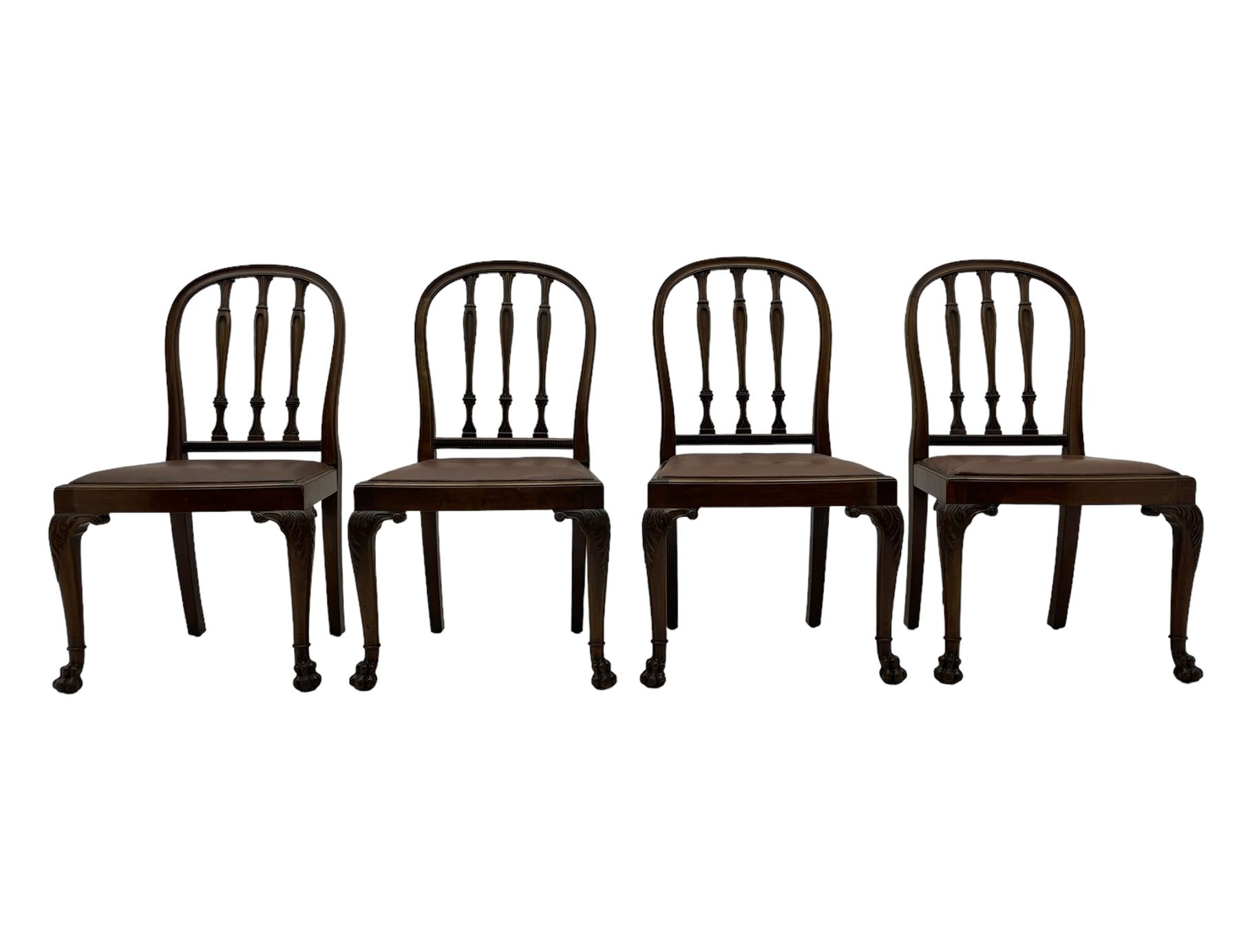 Set of six early 20th century Hepplewhite design mahogany dining chairs, moulded arched frame back, three shaped vertical rails carved with stylised foliate decoration, drop-in seats upholstered in brown fabric within moulded seat rails, on acanthus leaf carved cabriole supports with paw carved terminals 